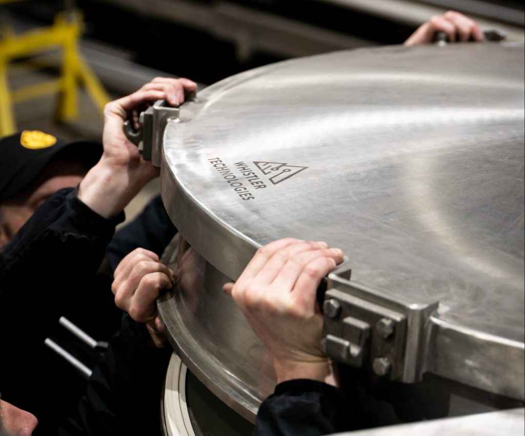 Engineers assisting with installation at a lab